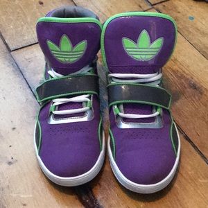 Purple and green adidas hightops